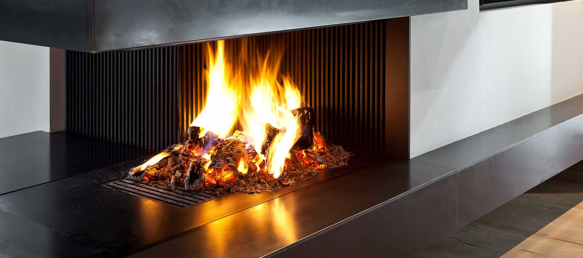 Schinharl Kamine München - Holzfeuer offener Betrieb